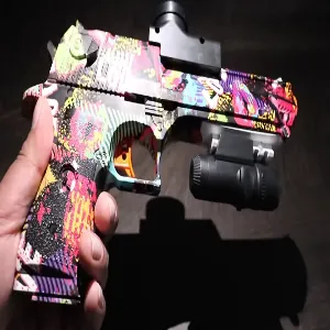 a shining multi color blaster orby pistol
